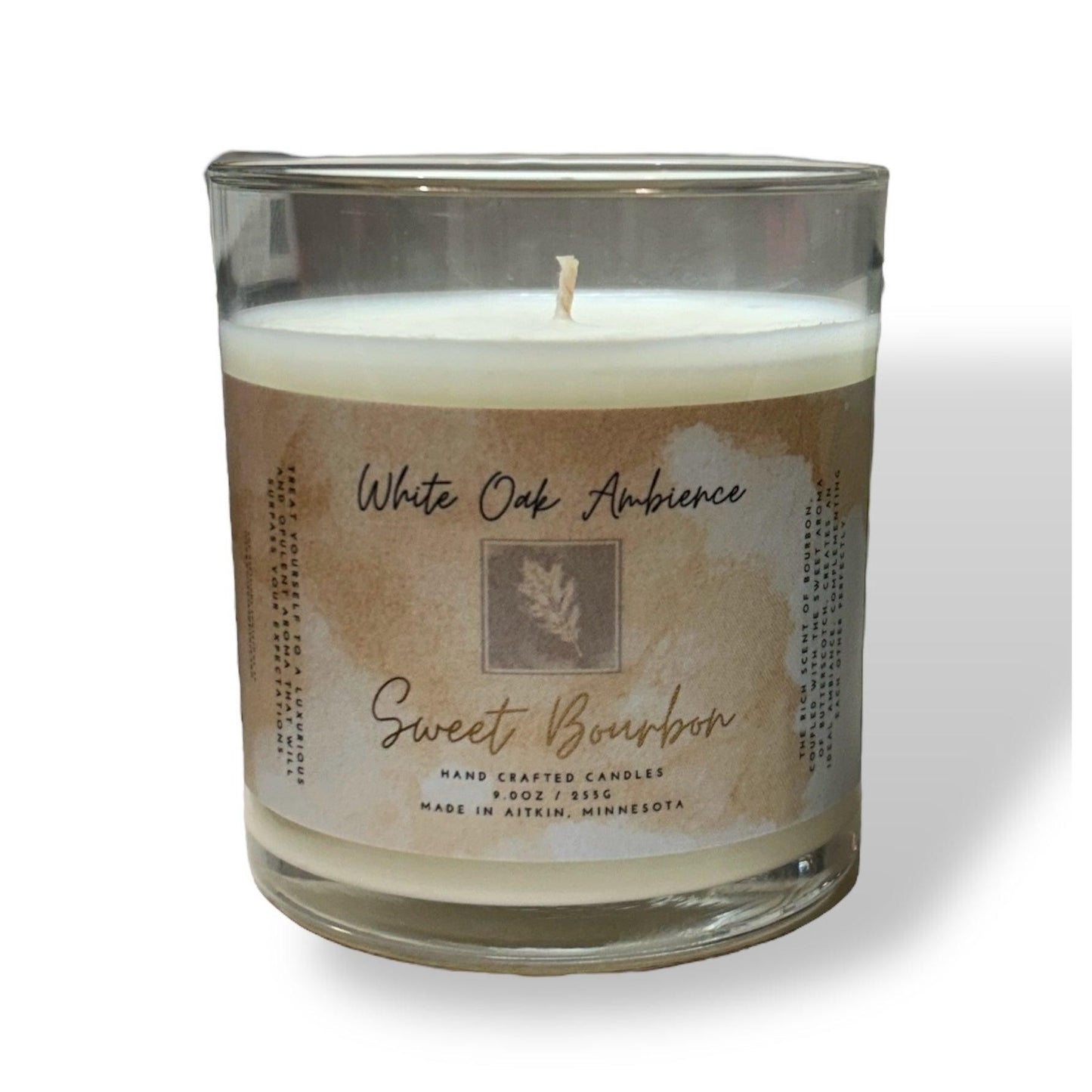 Sweet Bourbon Scented Candle in a glass jar with a label on a white background – a cozy candle from White Oak Ambience made with premium scented wax