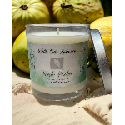 Fresh Melon Scented Candle with a label on a white background – a cozy candle from White Oak Ambience made with clean scented wax